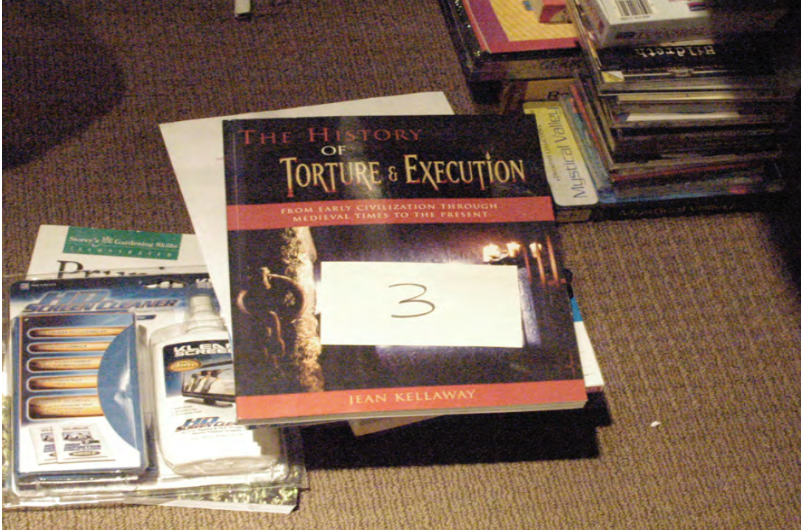 FBI search photo — A History of Torture book labeled and collected as Item 3